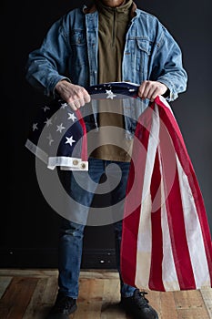 US flag and a man