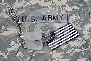 US flag patch with dog tag on Army Combat Uniform