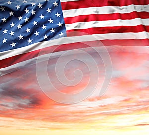 US flag in sunny sky