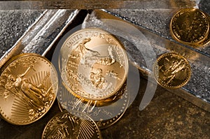 US Gold Eagles on Silver Bars