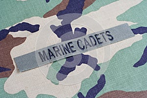 US MARINE CADETS branch tape on woodland camouflage uniform photo