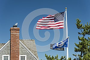 US Flag waving over blue sky photo