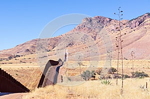 The US-Mexico border wall in Arizona desert