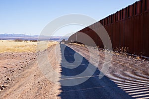 The US-Mexico border wall in Arizona desert