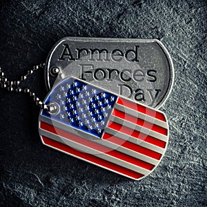 US military soldier\'s dog tags engraved with Armed Forces Day text