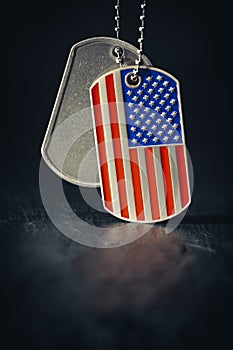 US military soldier`s dog tags in the shape of the American flag. Memorial Day for Veterans Day concept