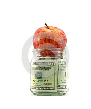 Nám peniaze v sklo škrípať šťavnatý jablko na z škrípať z dostať dividendy alebo výnos váš peniaze 
