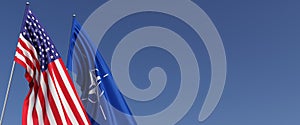 US and NATO flags on flagpoles on side. Flags on a blue background. Place for text. United States of America. Organization of the