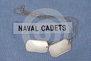 Us naval cadets uniform with blank dog tags photo
