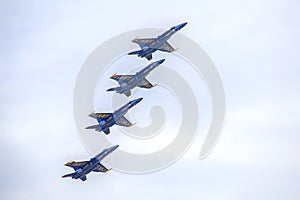US Navy Blue Angels Hornet Fighter Jets Flying In Formation, Behind Each Other At An Air Show At McDill Air Force Base