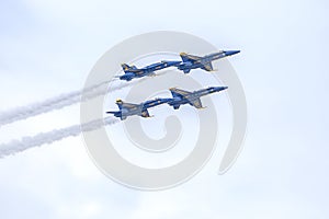 US Navy Blue Angels Hornet Fighter Jets Flying In Formation Upwards With Smoke Trails