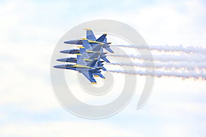 US Navy Blue Angels Hornet Fighter Jets Flying In A Tight Formation With Smoke Trails