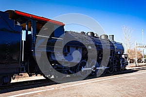 US old steam iron big locomotive on the station