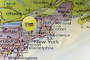 2016. US Open official tennis ball as pin on map of USA, pinned on New York