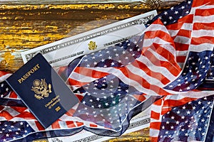 US passport and flag over a citizenship and naturalization certificate