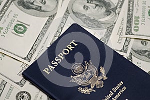 US Passport and pile of US dollar money