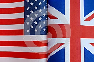 US and UK national flags close up concept