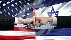 US vs Israel conflict, international relations crisis, fists on flag background