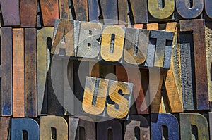 About Us Wooden typeset