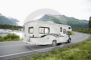 USA, Alaska, Recreational Vehicle Driving On Road