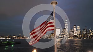 USA American flag. Memorial Day, Veteran's Day, July 4th. American Flag near New York City, Manhattan, Sunset. 4th