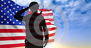 USA army soldier saluting on a background of sky. Veterans Day, Memorial Day, Independence Day background