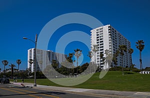 USA California Los Angeles Santa Monica District May 13, 2023 palm trees and buildings on the ocean