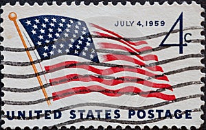 USA - Circa 1959 : a postage stamp printed in the US showing the U.S. flag with 49 stars debuted text: July 04, 1959