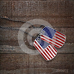 USA dog tags on wooden background