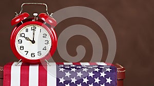 USA flag with alarm clock, election day or voting time background