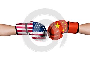 USA flag and China flag print screen on boxing gloves for symbols of barrier tariff trade war between United states of America and