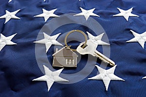 USA flag and key from home as symbol of VA loan. photo