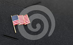 USA flag lapel pin on the collar of a suit