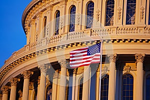 USA flag over Capitol Building in Washington, D.C.