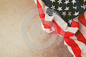 USA flag over vintage paper with copy space. 4th of july background