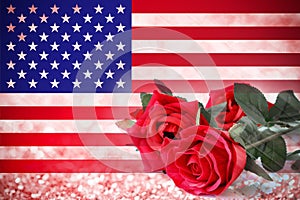 USA flag and red roses flowers background.