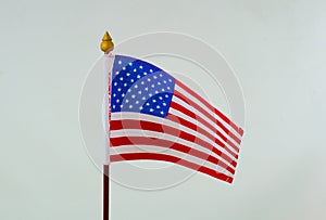USA flag small on white background.