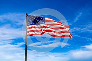 USA flag waving against sky