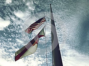 USA and Florida State Flag in a pole with sky. Photo image