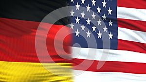 USA and Germany politicians exchanging top secret envelopes, flags background