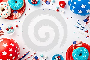USA Independence Day concept. Top view photo of national flags balloons confetti candles paper baking molds candies straws plates