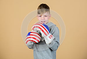 Usa independence day. Happy child sportsman in boxing gloves. workout of small boy boxer. punching knockout. Satisfied