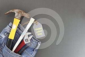 USA Labor day concept. Happy Labour day , International father`s day - Top view many handy tools with tag on gray background with