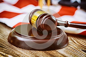 USA lawyers a US legal office with judge's gavel on American flag wooden table