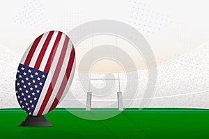 USA national team rugby ball on rugby stadium and goal posts, preparing for a penalty or free kick