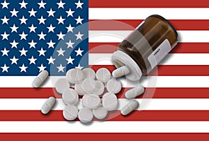 USA opioid crisis prescription bottle with pills on American flag