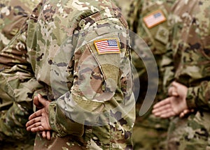 USA patch flag on soldiers arm. US troops photo