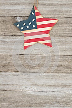 USA patriotic old flag on a stars and weathered wood background
