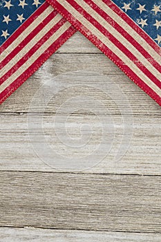 USA patriotic old flag on a weathered wood background