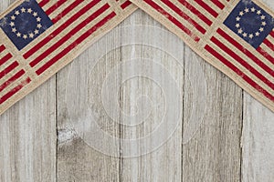 USA patriotic old flag on a weathered wood background